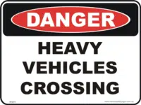 Heavy vehicles crossing danger sign