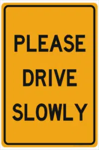 Please Drive Slowly sign
