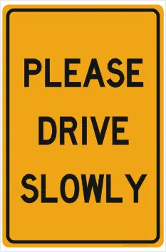 Please Drive Slowly sign