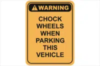 Chock wheels sign