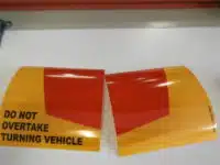 do not overtake turning vehicle signs