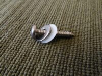 Sign fixing screw