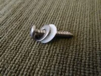 Sign fixing screw