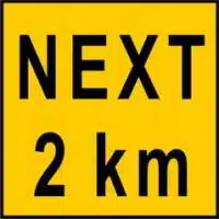 Next 2KM Sign