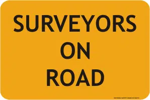 Surveyors on road sign