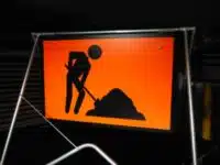 Workmen Ahead sign Fluro sign