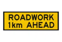 T1-16 Roadwork 1km ahead sign