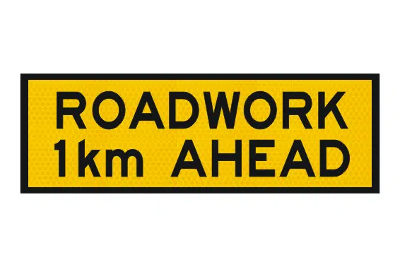 T1-16 Roadwork 1km ahead sign