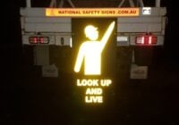 National Safety Signs pointing man