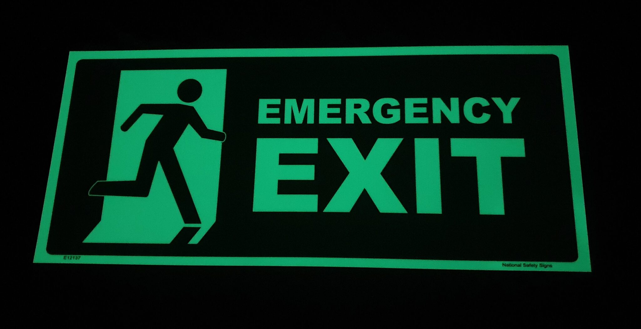 luminous exit signs