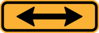 W8-23 Crossing Arrows (Double Ended Arrow) (Supplementary Sign)