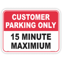 Red and white Customer Parking Only sign with a 15 minute maximum time limit